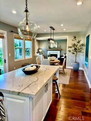 Dining room, Fireplace, Interior, Kitchen, Living room, Pendant Lights, Recessed Lighting, Wood Texture Flooring