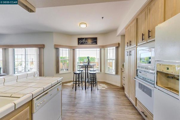 Interior, Kitchen, Tile Countertops, Wood Texture Flooring