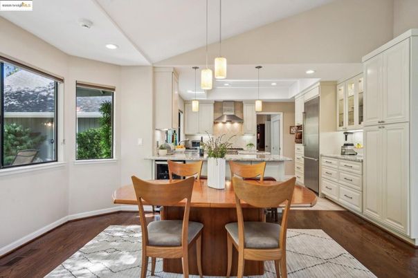 Dining room, Interior, Kitchen, Pendant Lights, Recessed Lighting, Stainless Steel Appliances, Wood Texture Flooring