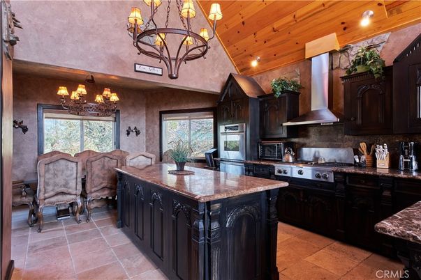 Chandelier, Dining room, Interior, Kitchen, Recessed Lighting, Stainless Steel Appliances, Wooden Beams, Wooden Ceilings
