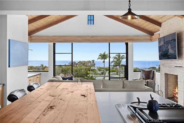 Dining room, Fireplace, Interior, Living room, Water, Wooden Beams, Wooden Ceilings, Wood Texture Flooring