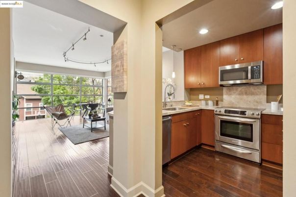 Dining room, Interior, Kitchen, Recessed Lighting, Stainless Steel Appliances, Wood Texture Flooring