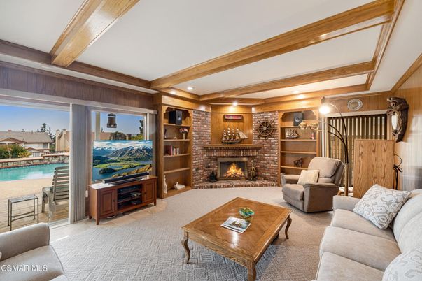 Fireplace, Interior, Living room, Recessed Lighting, Stone Walls, Wooden Beams