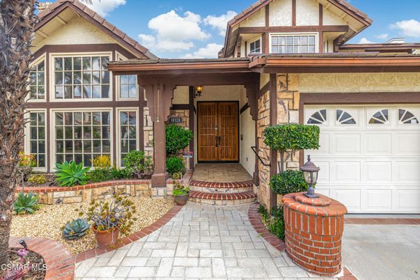 Attached, Exterior, Facade, Tudor Revival