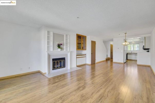 Empty room, Fireplace, Interior, Pendant Lights, Wood Texture Flooring