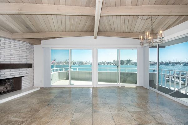 Empty room, Fireplace, Interior, Pendant Lights, Stone Walls, Water, Wooden Beams, Wooden Ceilings