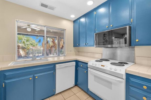 Interior, Kitchen, Recessed Lighting, Tile Countertops