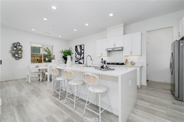 Dining room, Interior, Kitchen, Recessed Lighting, Stainless Steel Appliances, Wood Texture Flooring