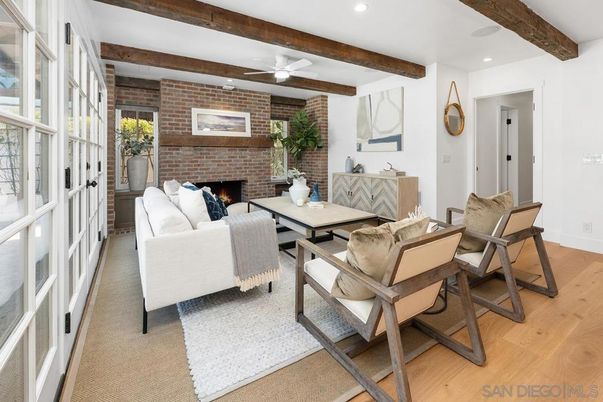 Dining room, Fireplace, Interior, Living room, Recessed Lighting, Stone Walls, Wooden Beams, Wood Texture Flooring
