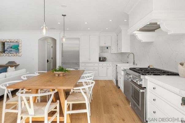 Dining room, Interior, Kitchen, Marble Walls, Pendant Lights, Recessed Lighting, Stainless Steel Appliances, Wood Texture Flooring