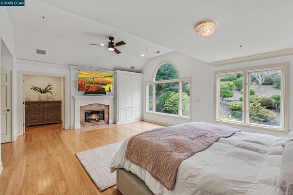 Bedroom, Fireplace, Interior, Recessed Lighting, Wood Texture Flooring