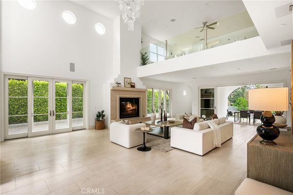 Chandelier, Dining room, Fireplace, Interior, Living room, Recessed Lighting, Wood Texture Flooring