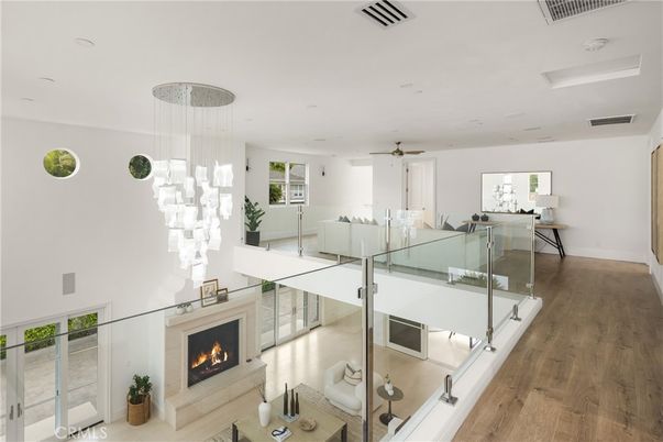Dining room, Fireplace, Interior, Living room, Pendant Lights, Recessed Lighting, Wood Texture Flooring