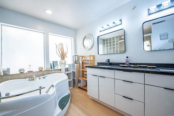 Bathroom, Dual Sink Vanities, Interior, Recessed Lighting, Wood Texture Flooring