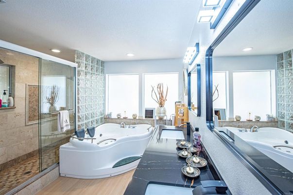 Bathroom, Dual Sink Vanities, Glass Shower, Interior, Recessed Lighting, Wood Texture Flooring