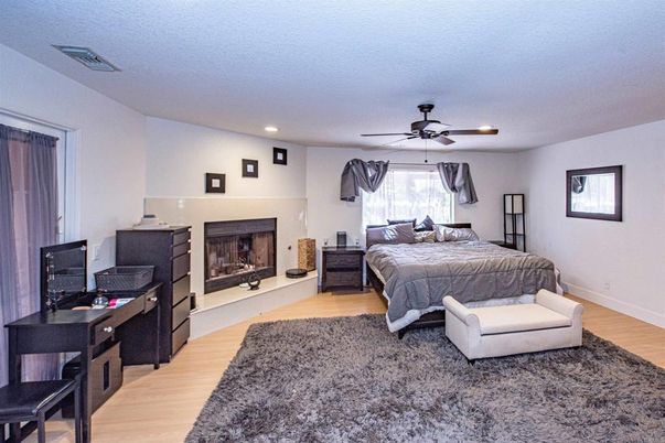 Bedroom, Fireplace, Interior, Recessed Lighting, Wood Texture Flooring