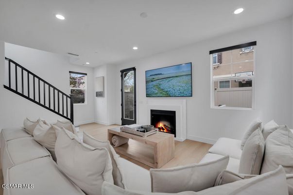 Fireplace, Interior, Living room, Recessed Lighting, Wood Texture Flooring