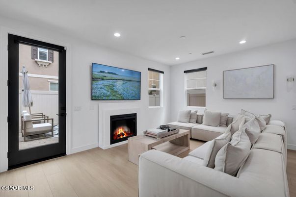 Fireplace, Interior, Living room, Recessed Lighting, Wood Texture Flooring