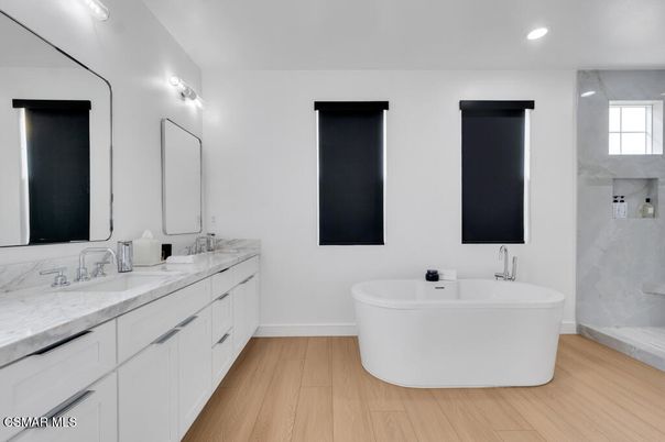 Bathroom, Dual Sink Vanities, Free Standing Baths, Interior, Recessed Lighting, Wood Texture Flooring