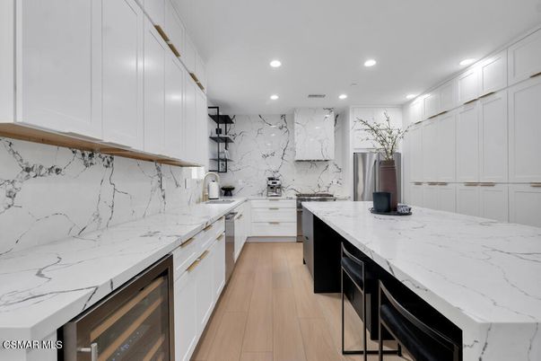 Interior, Kitchen, Marble Walls, Recessed Lighting, Wood Texture Flooring
