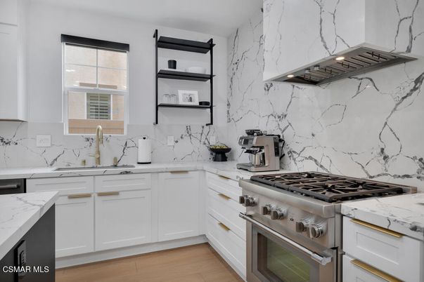 Interior, Kitchen, Marble Walls, Stainless Steel Appliances, Wood Texture Flooring