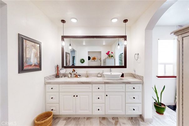 Bathroom, Dual Sink Vanities, Interior, Pendant Lights, Recessed Lighting, Wood Texture Flooring