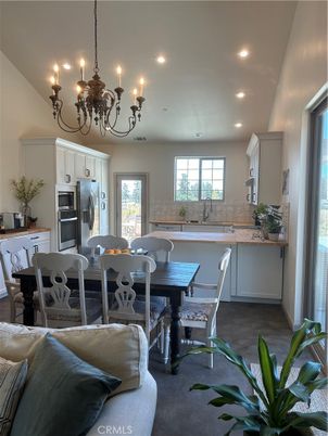 Chandelier, Dining room, Interior, Kitchen, Living room, Recessed Lighting, Stainless Steel Appliances