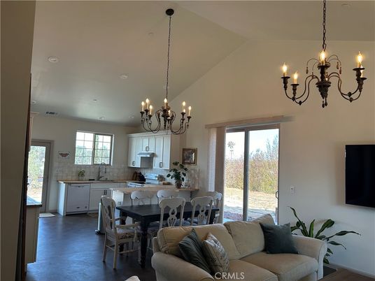 Chandelier, Dining room, Interior, Kitchen, Living room, Recessed Lighting, Stainless Steel Appliances, Wood Texture Flooring