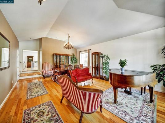 Chandelier, Interior, Living room, Piano, Recessed Lighting, Wood Texture Flooring
