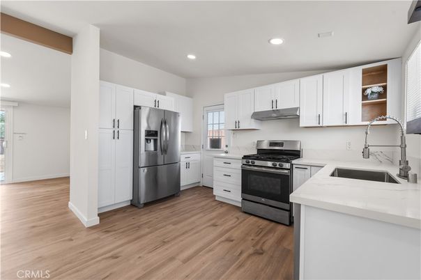 Interior, Kitchen, Recessed Lighting, Stainless Steel Appliances, Wood Texture Flooring