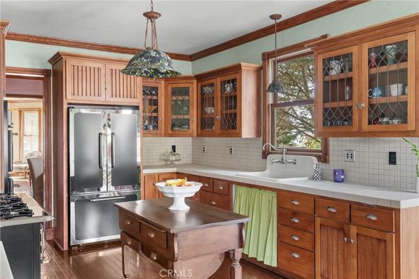 Interior, Kitchen, Pendant Lights, Tile Countertops, Wood Texture Flooring