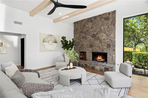 Fireplace, Interior, Living room, Recessed Lighting, Stone Walls, Wooden Beams, Wood Texture Flooring