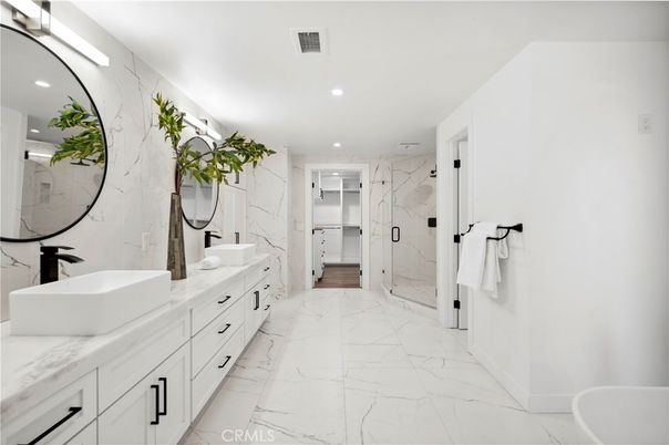 Bathroom, Dual Sink Vanities, Glass Shower, Interior, Marble, Marble Walls, Recessed Lighting