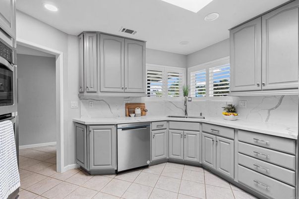 Interior, Kitchen, Marble Walls, Recessed Lighting, Stainless Steel Appliances
