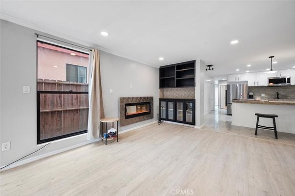 Fireplace, Interior, Kitchen, Pendant Lights, Recessed Lighting, Stainless Steel Appliances, Wood Texture Flooring