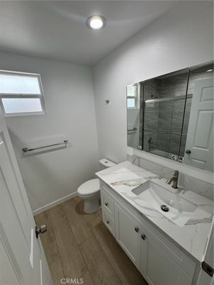 Bathroom, Glass Shower, Interior, Recessed Lighting, Wood Texture Flooring