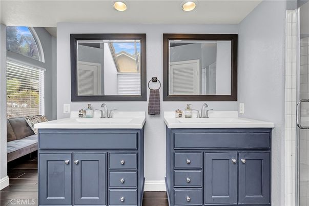 Bathroom, Dual Sink Vanities, Interior, Recessed Lighting, Wood Texture Flooring