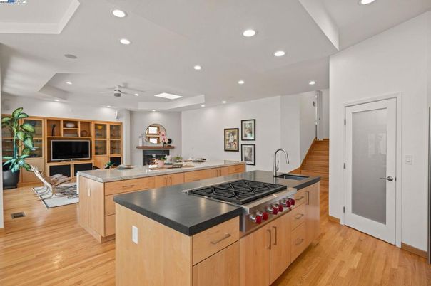 Fireplace, Interior, Kitchen, Living room, Recessed Lighting, Wood Texture Flooring