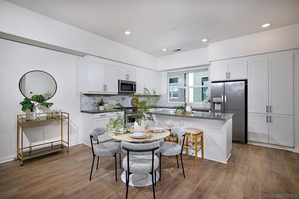 Dining room, Interior, Kitchen, Recessed Lighting, Stainless Steel Appliances, Wood Texture Flooring