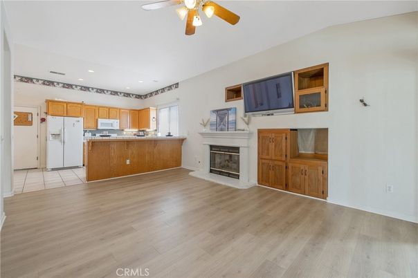 Empty room, Fireplace, Interior, Kitchen, Recessed Lighting, Wood Texture Flooring