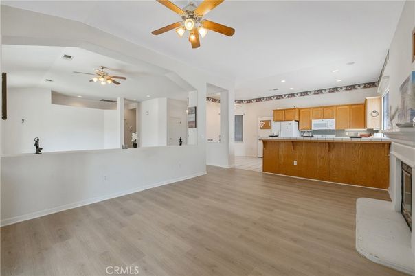 Empty room, Fireplace, Interior, Kitchen, Recessed Lighting, Wood Texture Flooring
