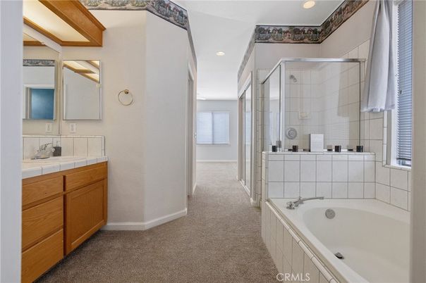 Bathroom, Dual Sink Vanities, Glass Shower, Interior, Recessed Lighting, Tile Countertops