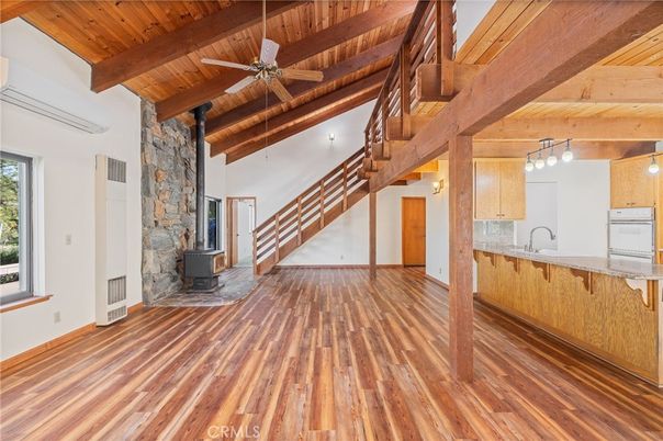 Empty room, Fireplace, Interior, Kitchen, Stone Walls, Wooden Beams, Wooden Ceilings, Wood Texture Flooring