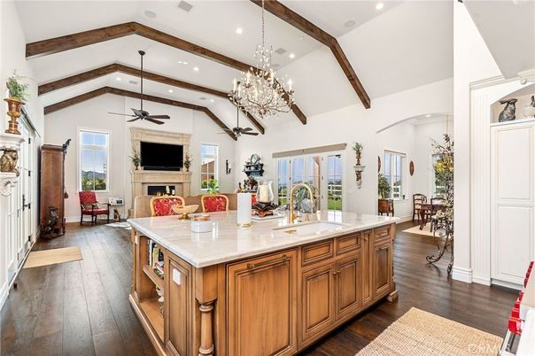 Chandelier, Fireplace, Interior, Kitchen, Living room, Recessed Lighting, Wooden Beams, Wood Texture Flooring