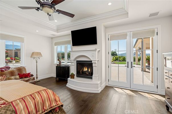 Bedroom, Fireplace, Interior, Recessed Lighting, Wood Texture Flooring