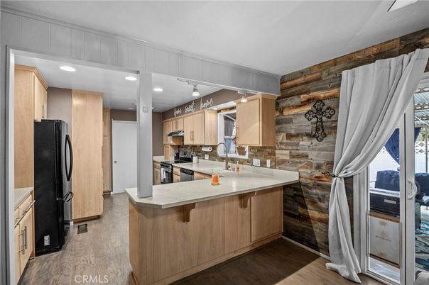 Interior, Kitchen, Recessed Lighting, Stainless Steel Appliances, Wood Texture Flooring, Wooden Walls