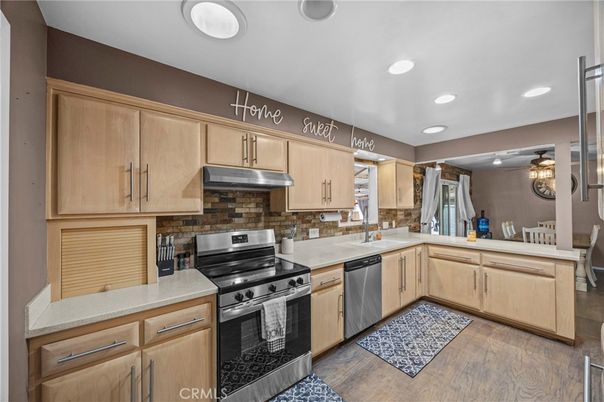 Dining room, Interior, Kitchen, Recessed Lighting, Stainless Steel Appliances, Wood Texture Flooring