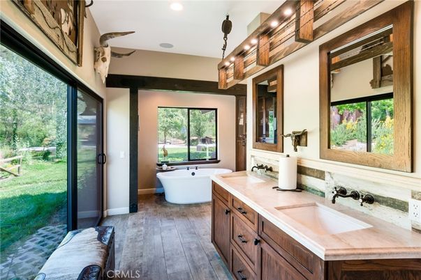 Bathroom, Dual Sink Vanities, Free Standing Baths, Interior, Pendant Lights, Recessed Lighting, Wood Texture Flooring