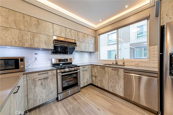 Interior, Kitchen, Recessed Lighting, Stainless Steel Appliances, Wood Texture Flooring