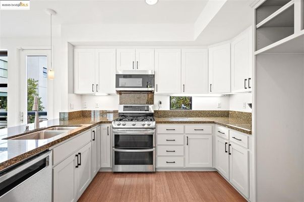 Interior, Kitchen, Pendant Lights, Recessed Lighting, Stainless Steel Appliances, Wood Texture Flooring